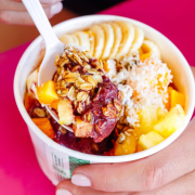 Açai Bowl · Dairy free açai, gluten free granola, local fruit, coconut flakes & honey. Add blueberries, strawberries, peanut butter, cacao nibs, hemp hearts, mochi or sweet cream +$1.50