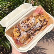 Aunties Grilled Banana Bread · House made grilled banana bread topped with apple banana slices, peanut butter, honey, cacao nibs & coconut flakes